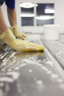 wiping down work surface in dairy